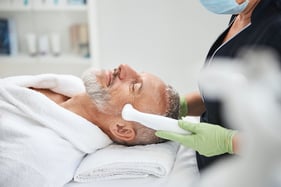 aging man looking relaxed during skin rejuvenation 3RCVDFW aging man looking relaxed during skin rejuvenation 3RCVDFW